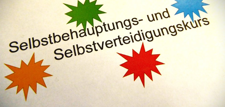 Schriftzug mit bunten Sternen